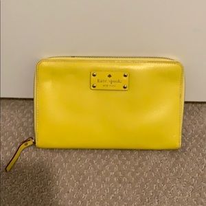 Kate spade yellow passport wallet